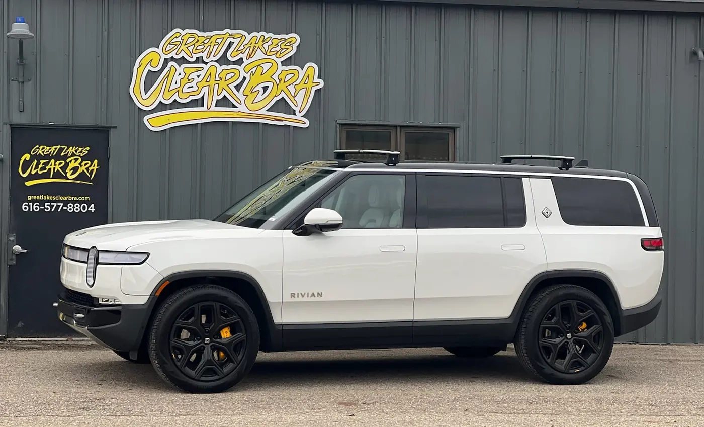 White Rivian outside the Great Lakes Clear Bra shop